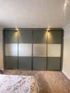 3 panel split door with Reed green - white - reed green panels with a champagne frame, fitted in Norton